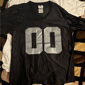 Woman raiders 00 jersey medium